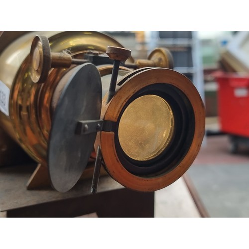 133 - Star Lot - A fabulous heavy metal Magic Lantern dating to the 1880s with brass lens frame. Still wir... 