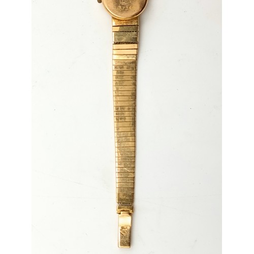 41 - Star Lot: A beautiful stylish vintage Omega 18 carat gold ladies wrist watch, stamped 750 to watch a... 