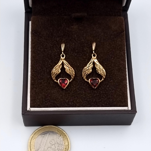 14 - A fabulous pair of 9 carat gold drop stud earrings, featuring intricate incised detail and each set ... 