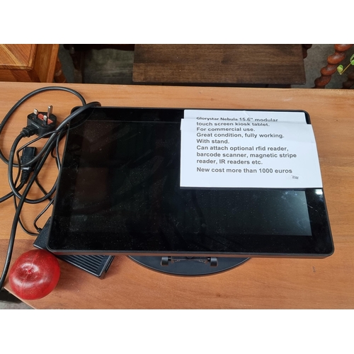 A Glorystar Nebula 15.6" modular touchscreen kiosk tablet. For commercial use, in great and fully working condition and complete with stand. With the option of attaching optional RFID reader, barcode scanner, magnetic stripe reader, IR readers etc. A high quality piece that costs over €1000 new.