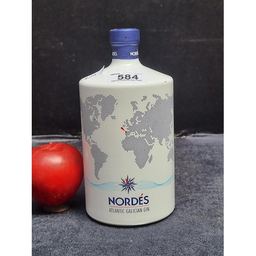 584 - A sealed 1L bottle of Nordes Atlantic Galician Gin in unusual ceramic bottle.