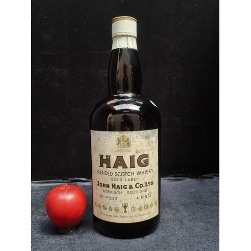 597 - Star lot : A very large sealed 4 pints capacity vintage bottle of Haig blended scotch whisky gold la... 