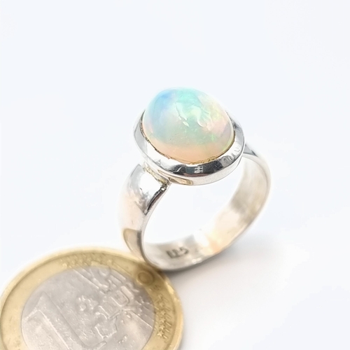 614 - A truly beautiful 6 carat Australian Fire Opal sterling silver ring. This is one of the brightest Fi... 