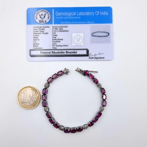 625 - Star Lot : A fine example of a Rhodolite and Diamond sterling silver tennis bracelet, of 11.9 grams.... 