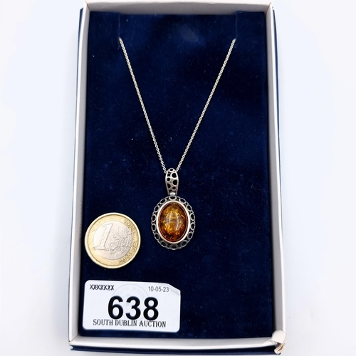 638 - A lovely Baltic fire Amber sterling silver pendant and chain, this necklace features a intricate cir... 