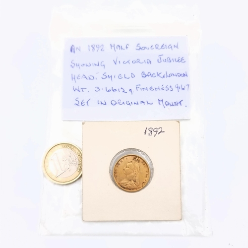 641 - Star Lot: A rare 1892 half Sovereign, this coin showcases the Victoria Jubilee head and shield back,... 