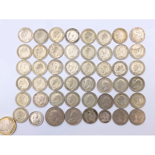 650 - A large collection of 42 Edwardian silver six pences, of a total weight of 132.41 grams. Together wi... 