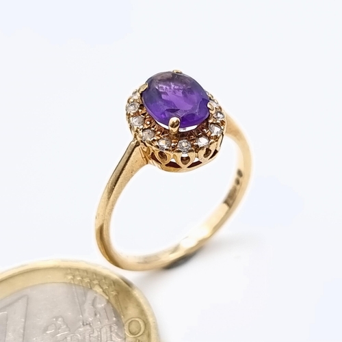 652 - Star Lot : A fine example of a 9 carat gold ring, which features an Amethyst central stone and surro... 