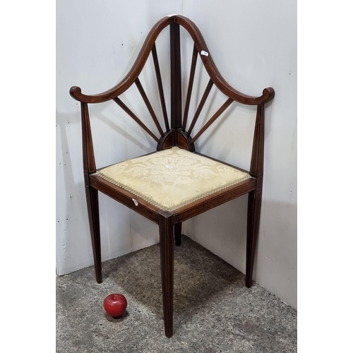 671 - Star lot : A gorgeous early 20th century corner chair with beautiful scroll backrest boasting string... 