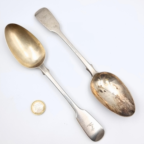 57 - A pair of early Georgian fiddle patter sterling silver serving spoons. Hallmarked London, circa 1843... 