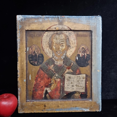 65 - Star Lot : A stunning original early 18th century  coptic  Icon painting featuring St Nicholas to ce... 