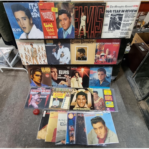 704 - Twenty vinyl record albums of Elvis including It's A Sin (2015), Elvis in Girls Girls Girls (1977) a... 