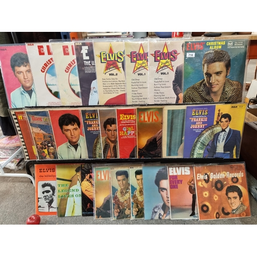 718 - Twenty-seven vinyl record albums of Elvis Presley including Elvis' Christmas Album (1964), Elvis Dou... 