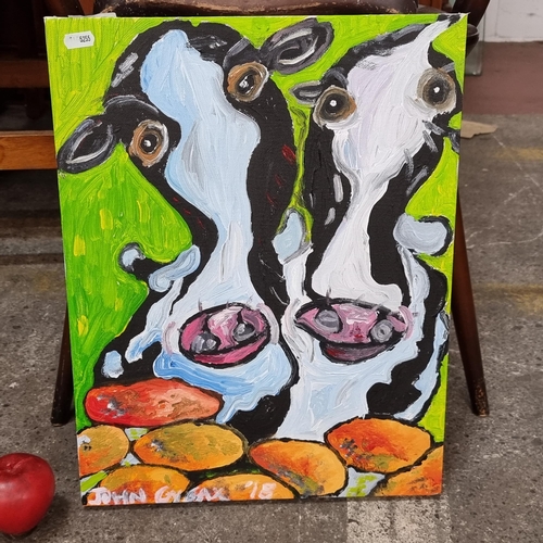 738 - A striking modern acrylic on canvas painting of two psychadelic cows in bright colours by a stone wa... 