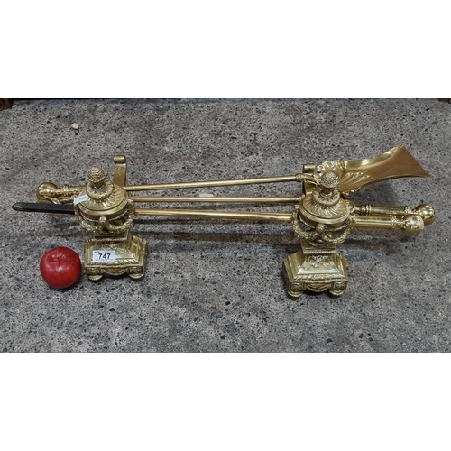 747 - Star lot : A very handsome polished brass fire iron set including a pair of fabulous  fire dogs with... 