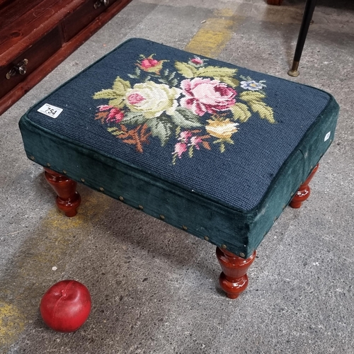 754 - A charming footstool with lovely turned wood legs and upholstered in a dark teal fabric with embroid... 