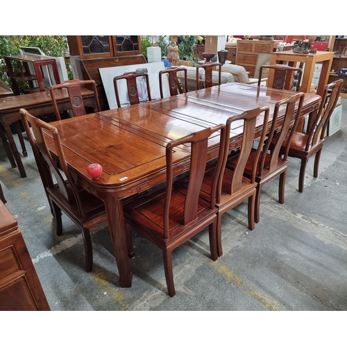 759 - Star Lot : A breathtaking large Chinese wooden extendable Rosewood  dining table with ten matching d... 