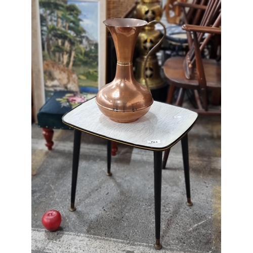 761 - Two items consisting of a vintage Mid Century side table with brass toned trim to top, held on taper... 