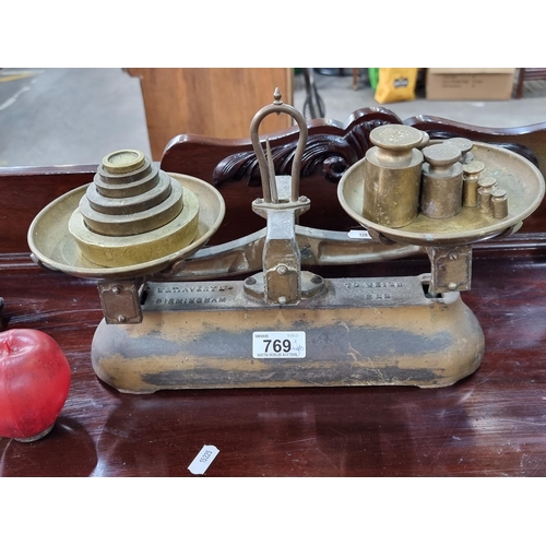 769 - A fabulous heavy antique kitchen weighing scales made by W & T Avery Ltd. including brass dishes and... 