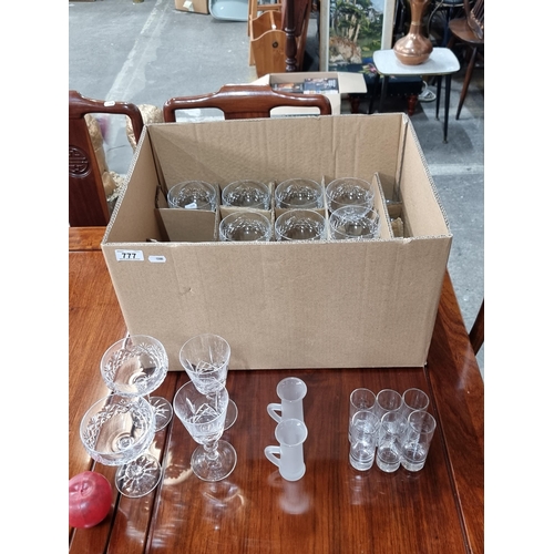 777 - A box containing twenty eight glasses of delicate Irish cut crystal including stemmed glasses with k... 