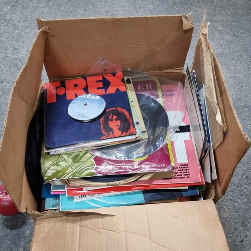 793 - A box filled with a large collection of vintage vinyl singles and albums. Covering a wide range of g... 