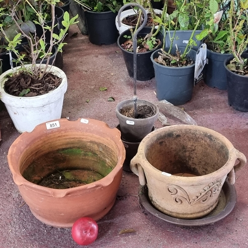 851 - Three terracotta planters including a hanging two pot example, a wide fluted edge example and a orna... 