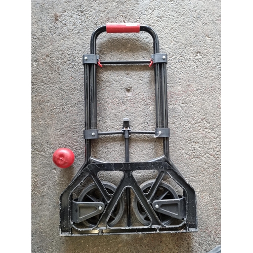 860 - A folding hand truck with extendable handle. Perfect for bringing in the car etc as it tucks away to... 