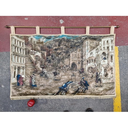 938 - A large vintage  wall hanging wall tapestry depicting a Renaissance scene on 
rectangular fabric fin... 