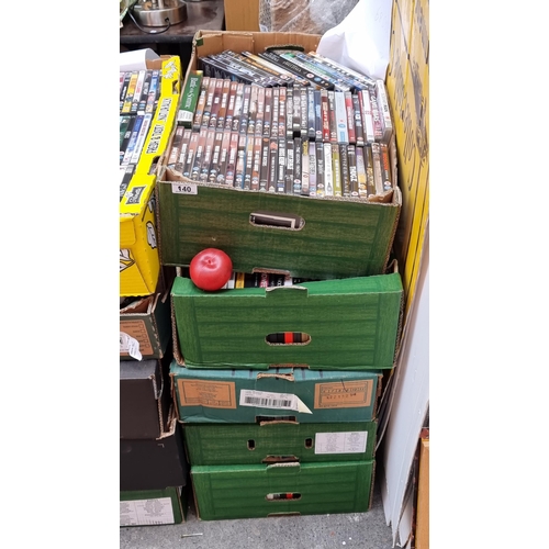 940 - Five large boxes containing approx. 350 DVDs with various films including action and documentary exa... 