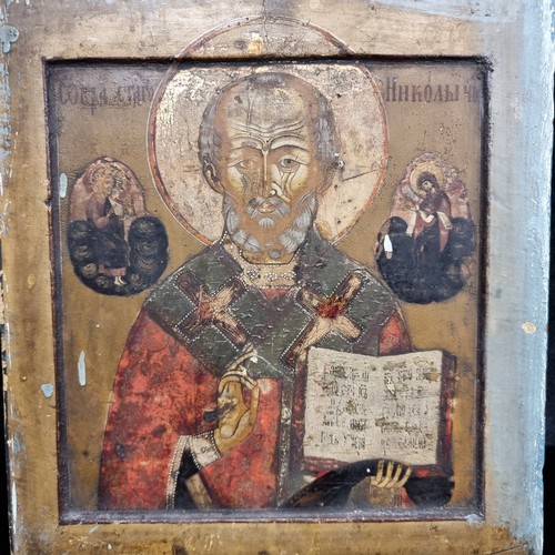 65 - Star Lot : A stunning original early 18th century  coptic  Icon painting featuring St Nicholas to ce... 