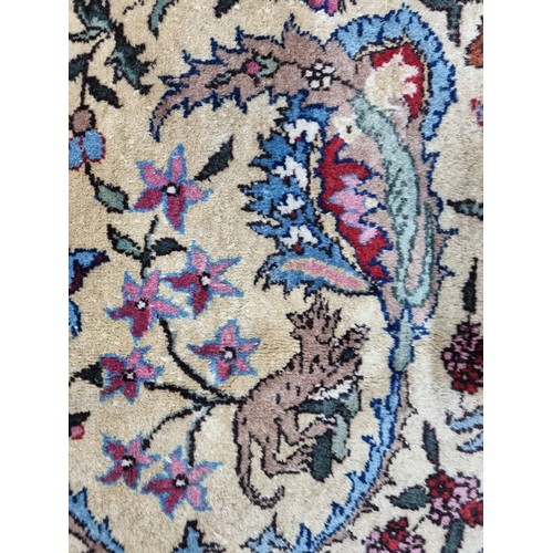 867 - Star lot : A fabulous hand knotted, hand finished thick pile wool rug in a Persian pattern in red, c... 