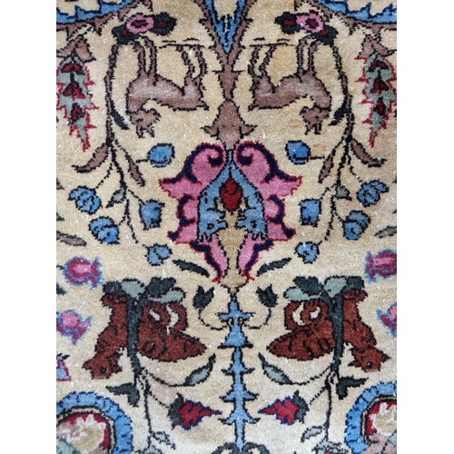 867 - Star lot : A fabulous hand knotted, hand finished thick pile wool rug in a Persian pattern in red, c... 