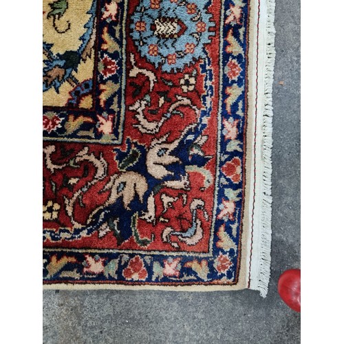 867 - Star lot : A fabulous hand knotted, hand finished thick pile wool rug in a Persian pattern in red, c... 