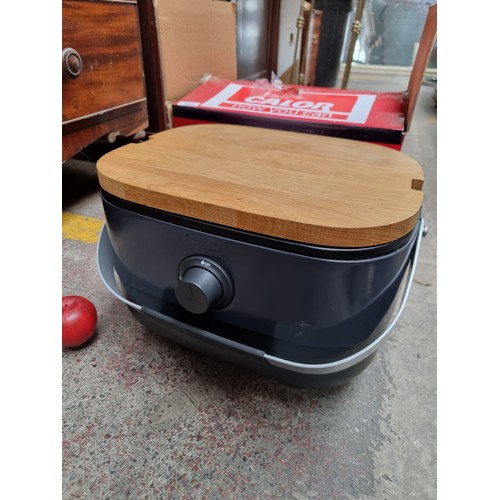 383 - A Calor Mini-BBQ with gas connections, chopping board and super lightweight grill for outdoor cookin... 