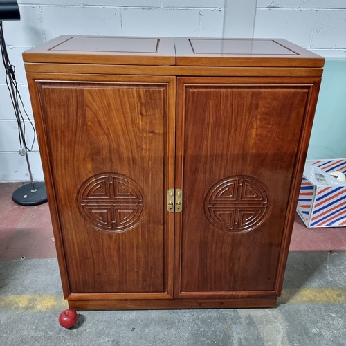 757 - Star lot : An incredible folding Rosewood Chinese wooden bar unit decorated with carved Chinese Fu s... 