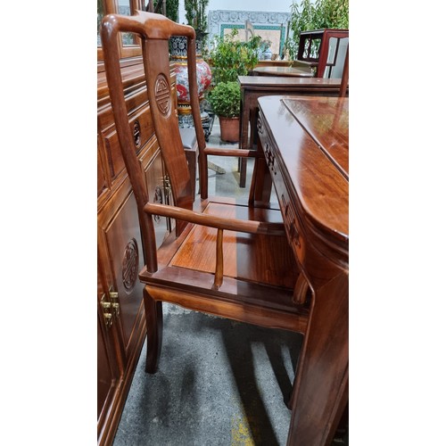 759 - Star Lot : A breathtaking large Chinese wooden extendable Rosewood  dining table with ten matching d... 