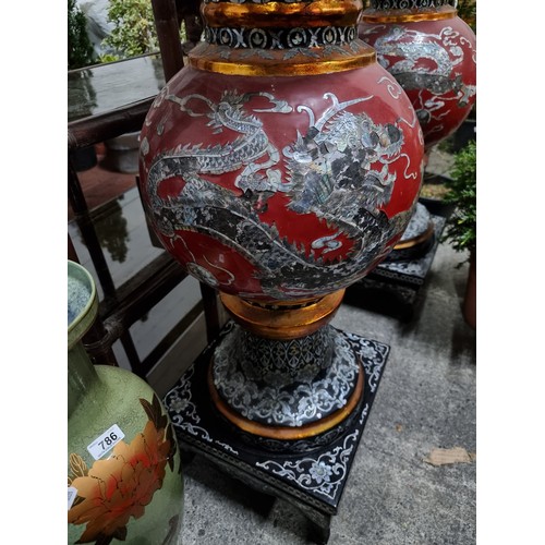 780 - Star Lot : A very impressive pair of vintage large Chinese urns, set on square plinth bases. These f... 