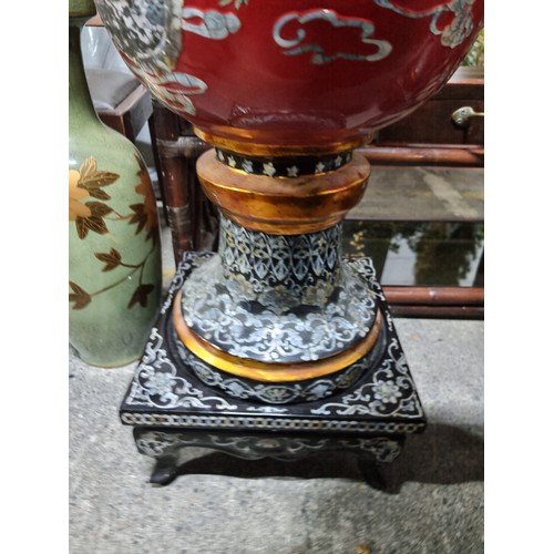 780 - Star Lot : A very impressive pair of vintage large Chinese urns, set on square plinth bases. These f... 