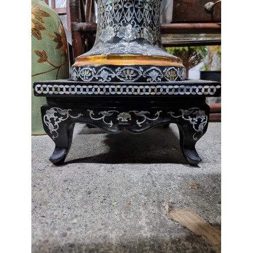 780 - Star Lot : A very impressive pair of vintage large Chinese urns, set on square plinth bases. These f... 