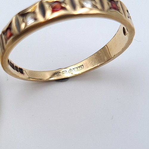 13 - A beautiful 9 carat gold half eternity ring, featuring star set Garnet and White Sapphire gem stones... 