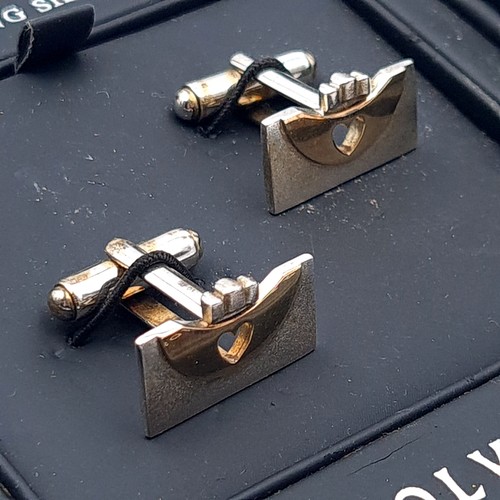 15 - A striking pair of Solvar sterling silver cuff links, featuring gold crowned inlay. Total weight of ... 