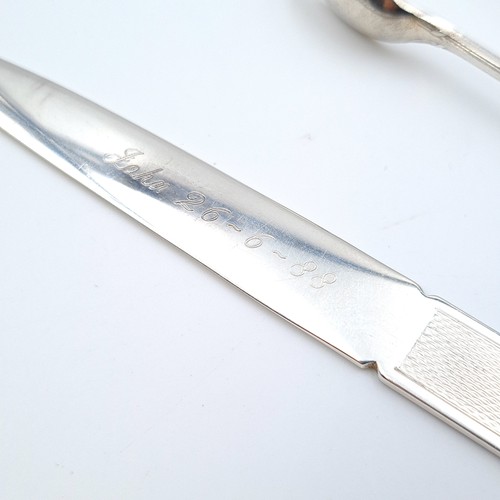 21 - A collection of two sterling silver items, comprising of a modern style letter opener. Hallmarked Bi... 