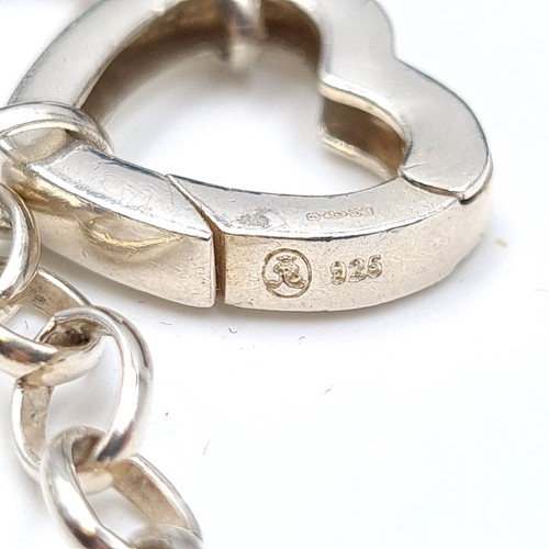 46 - A modernist sterling silver bracelet, featuring a sleek heart shaped t-bar clasp. Weight of bracelet... 