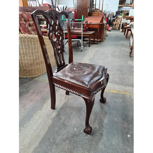 657 - Star Lot :  A beautiful antique Solid mahogany dining suite with a large extendable table along with... 