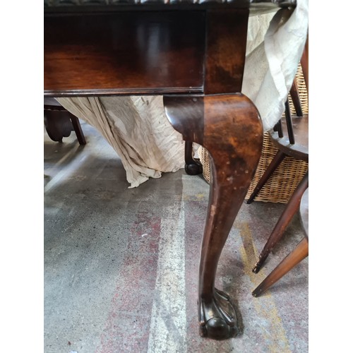 657 - Star Lot :  A beautiful antique Solid mahogany dining suite with a large extendable table along with... 