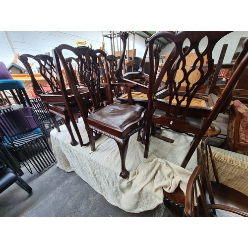 657 - Star Lot :  A beautiful antique Solid mahogany dining suite with a large extendable table along with... 