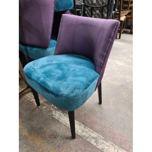 696 - A set of three striking armchairs by Sandalyeci with plush cushions in a turquoise shade and deep pu... 