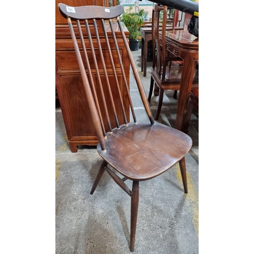 731 - Star Lot : Four fabulous vintage spindle back dining chairs including two 'Goldsmith' carvers from t... 