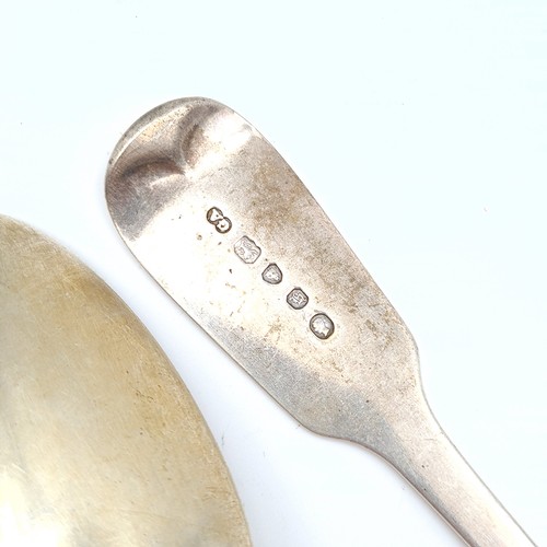 57 - A pair of early Georgian fiddle patter sterling silver serving spoons. Hallmarked London, circa 1843... 