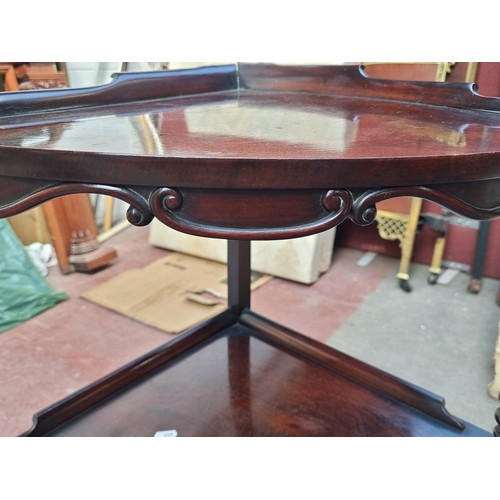 673 - Star lot : A beautiful mid 19th century Jamiacian mahogany three-tiered corner what-not shelving uni... 